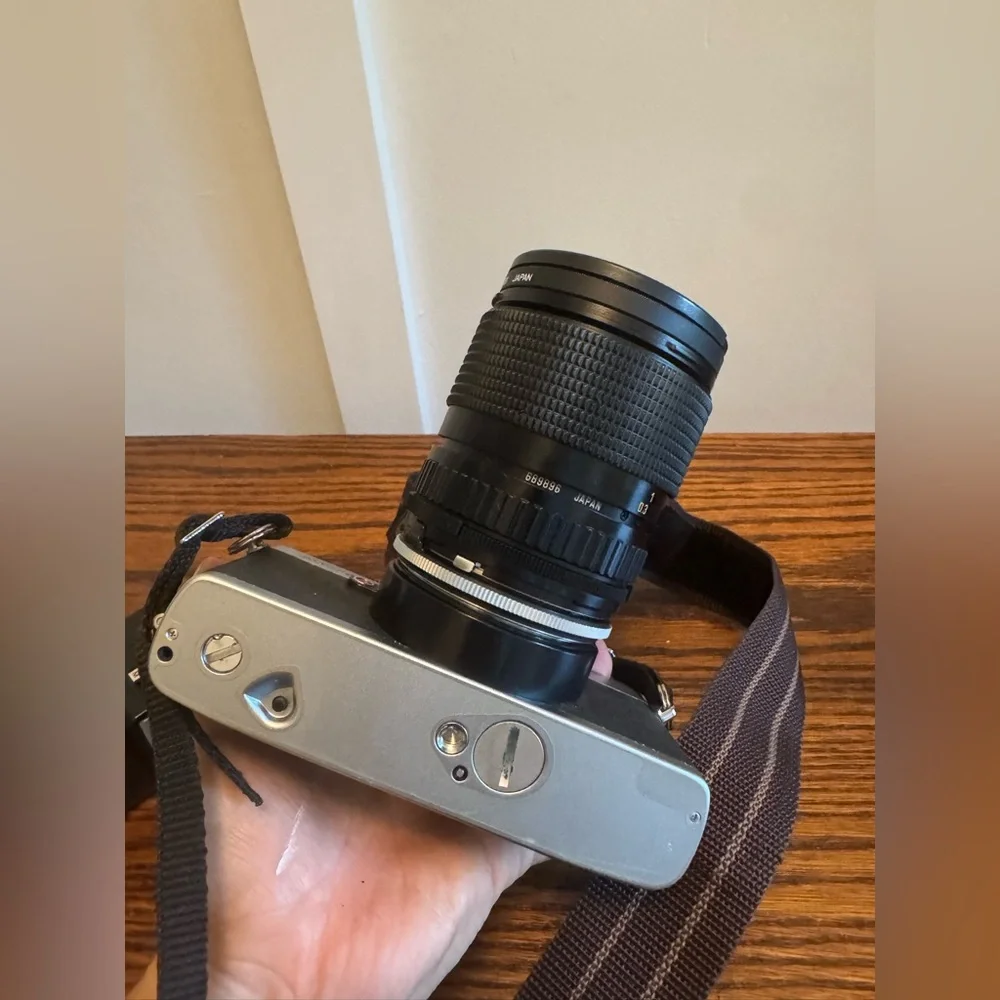 Minolta XG-A 35mm Film Camera with Black Tamron Lens Cap and photo flash Unit